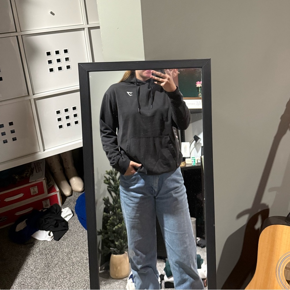 Black Hoodie and Blue Jeans